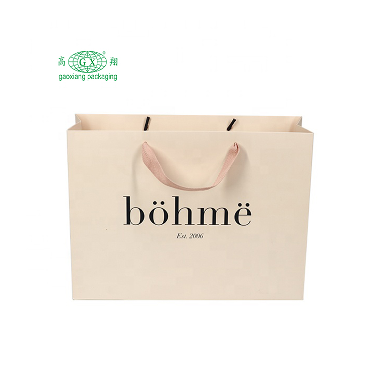 Preço barato por atacado presente de marca famosa de luxo personalizado impresso saco de papel kraft branco com seu próprio logotipo