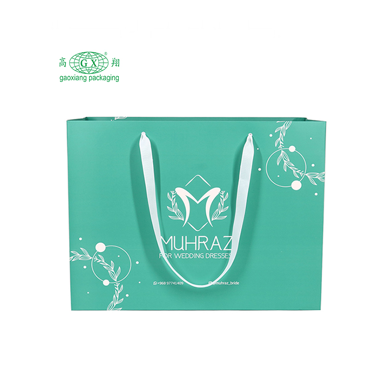 Preço barato por atacado presente de marca famosa de luxo personalizado impresso saco de papel kraft branco com seu próprio logotipo